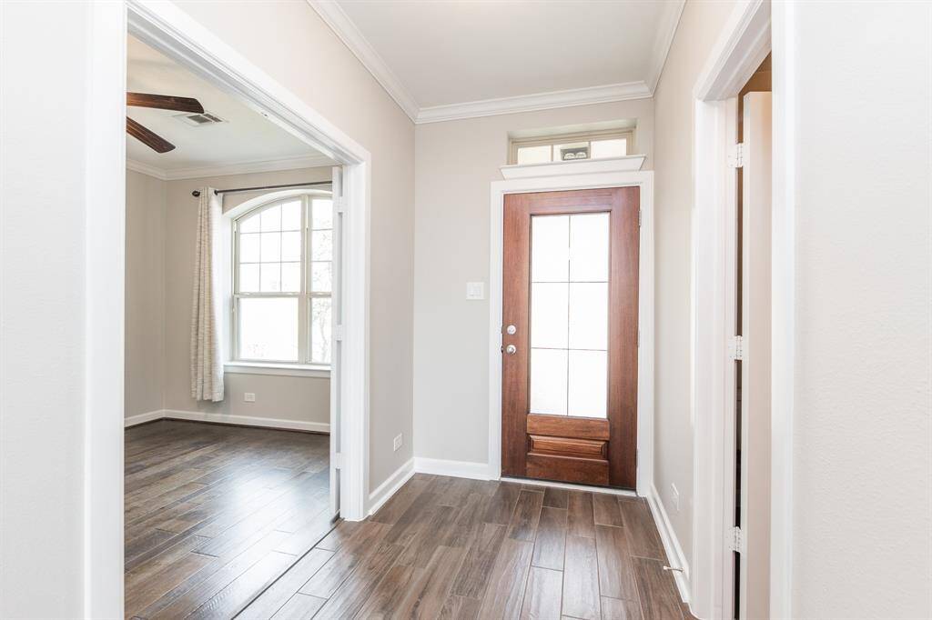 Front entry with wood-looking tile flooring!