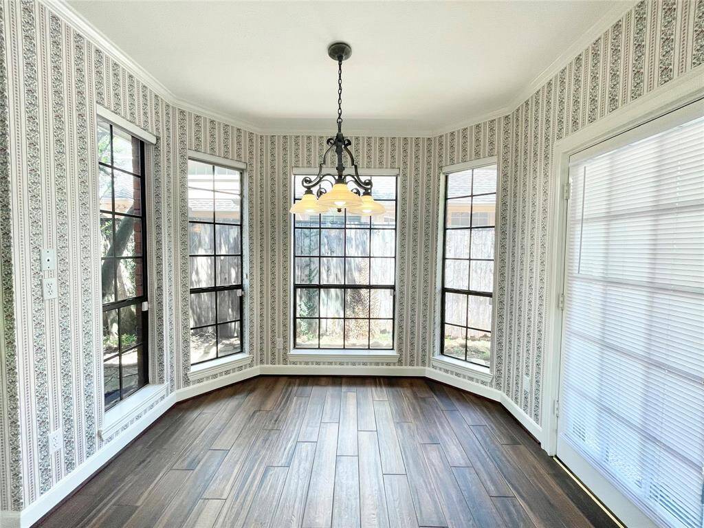 Wall to ceiling windows in the breakfast area with views of your outdoor space.