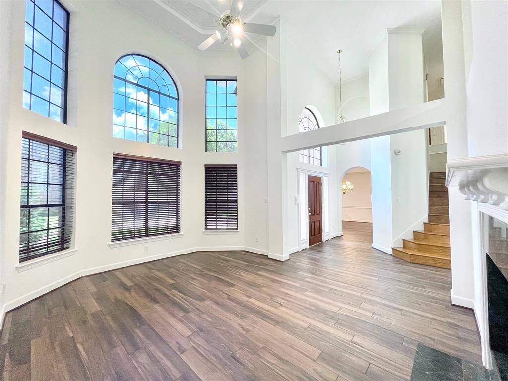 View of the formal living. Beautiful windows and high ceilings.