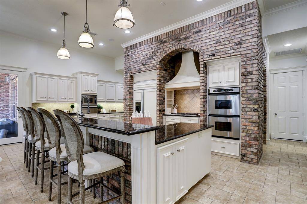 Walk-in Pantry behind brick wall - not shown.