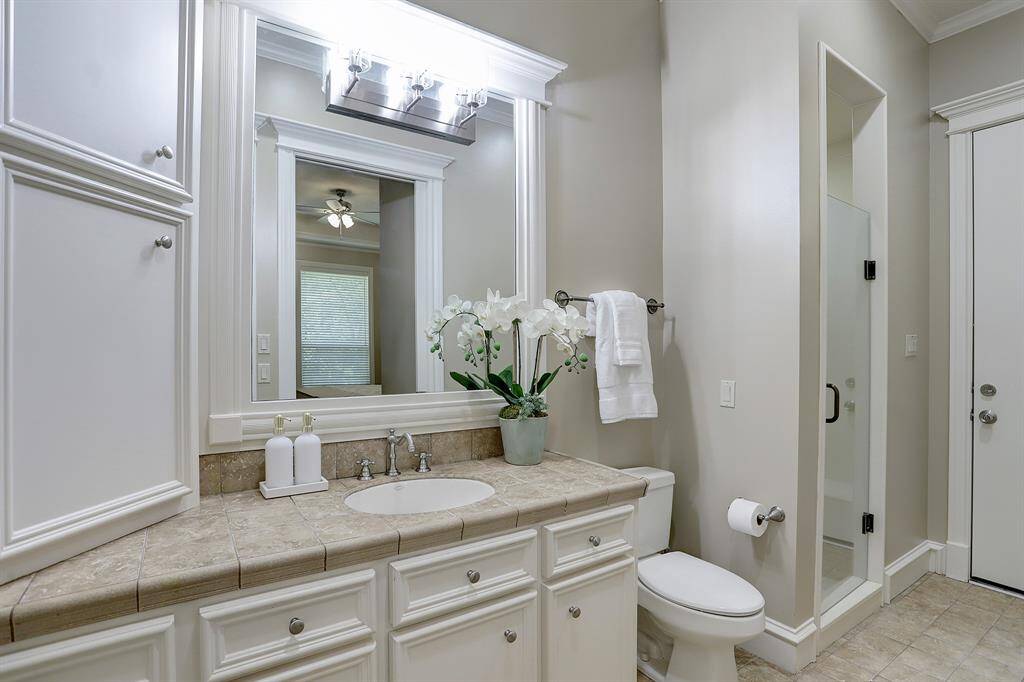 Guest bath also functions as pool bath.