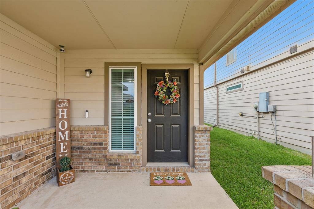 Approaching the front door is the covered front porch.