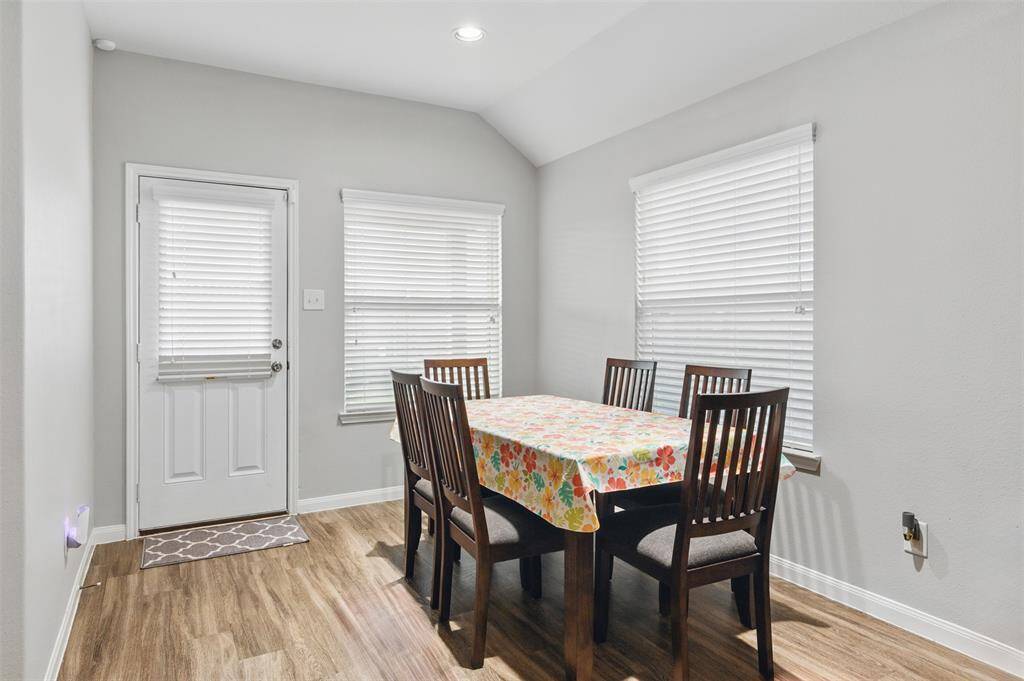 The room is enhanced by recessed lighting.