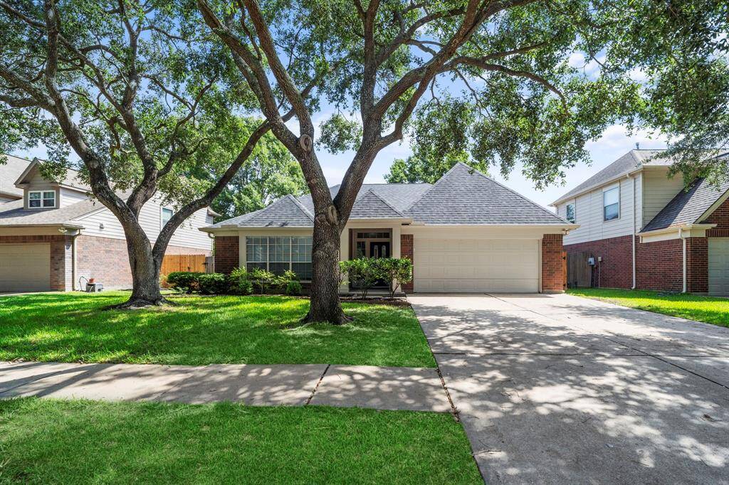 Nestled on a quiet street in the heart of Cinco Ranch, this inviting single-story home features a welcoming front porch and classic brick elevation. Zoned to award-winning Katy ISD schools, this one is a must-see!
