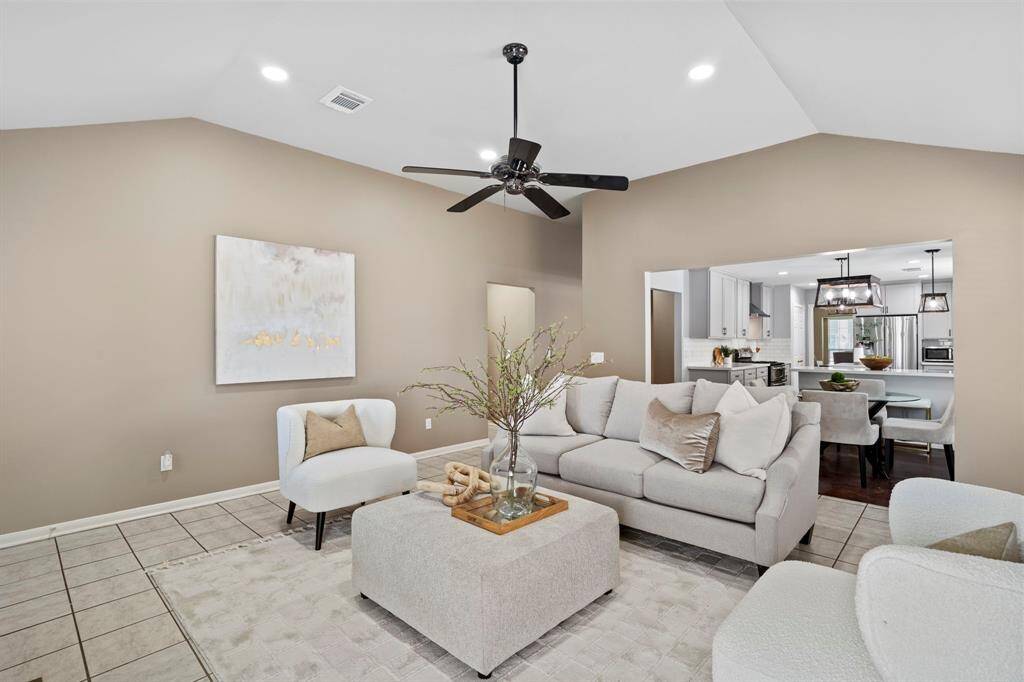 Enjoy seamless flow between the family room and kitchen, with sightlines that make entertaining and everyday living easy and comfortable.