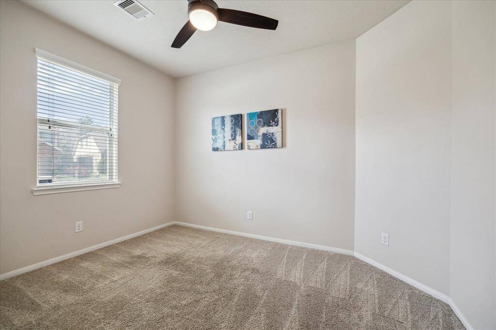 Secondary Bedroom located at the front of the home.