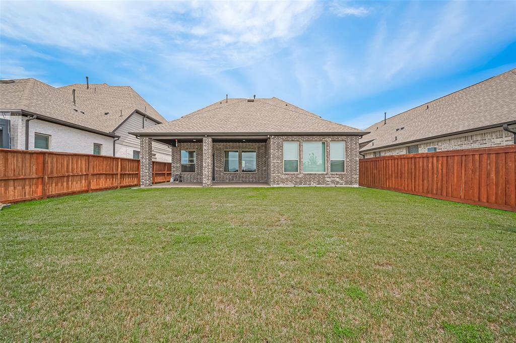 Enjoy outdoor living in a generously sized backyard with no rear neighbors, offering privacy and tranquility