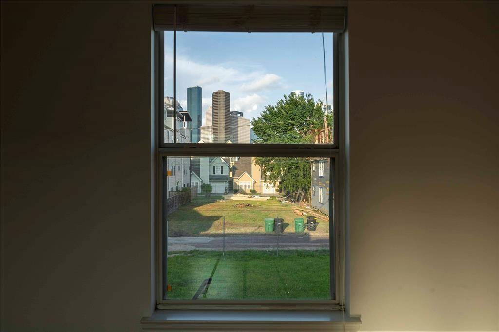 Downtown views from your primary bedroom