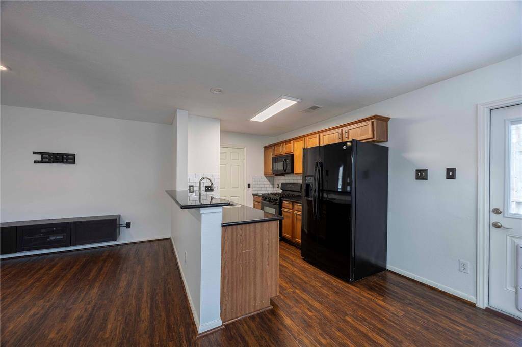 Dining view to living and kitchen