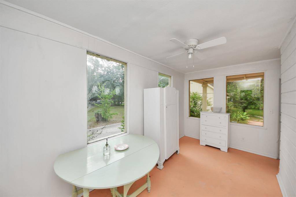 A tranquil space to relax, meditate, read, or simply rest—this sunroom invites peace and quiet.