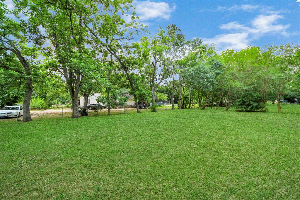 The left side of the yard is so spacious, it could easily accommodate an entire additional home!