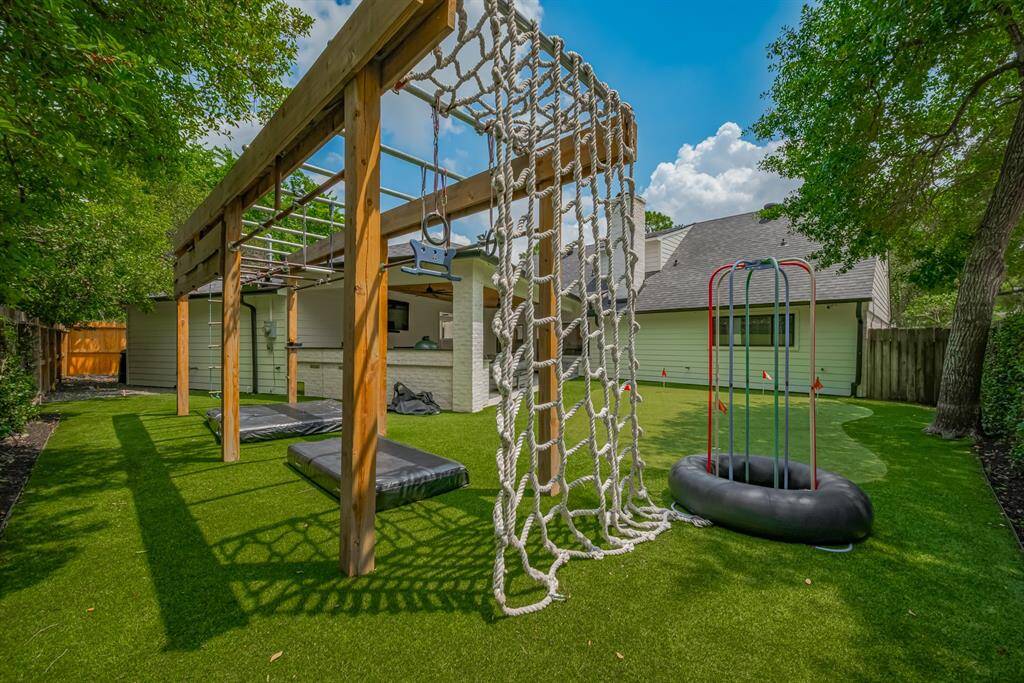 BACKYARD- Another view of this incredible play structure.