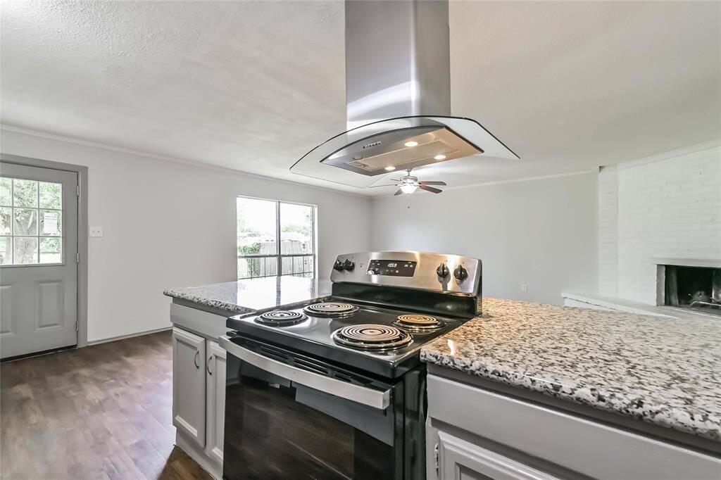 Island has Range with stainless vent hood