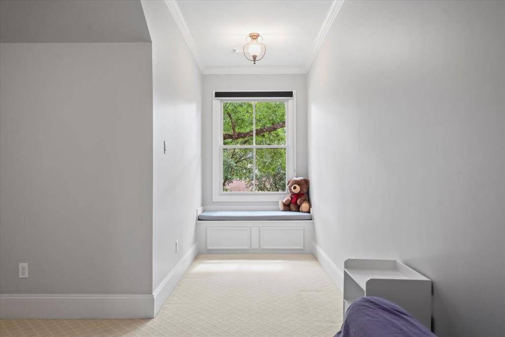2nd Floor Bed #4 features a cozy dormer window with bench and storage cabinet.