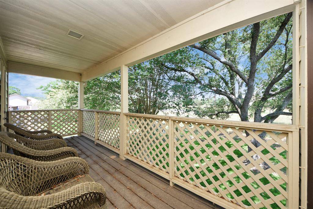Balcony outside primary bedroom, overlooking the green belt.