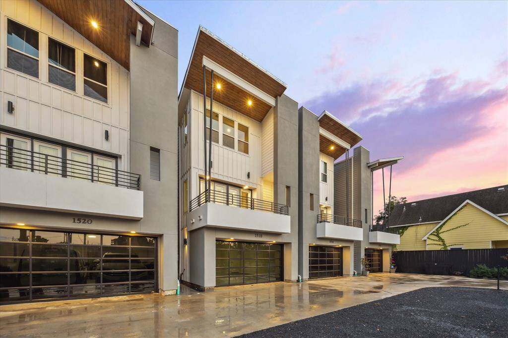 This modern architectural beauty is a statement of contemporary design with clean lines, tempered glass garage doors, and sophisticated lighting. Its unique facade stands out at dusk, with a layout perfect for urban luxury and convenience in the heart of Houston. This residence combines functionality with an artful edge, ideal for those seeking a refined city lifestyle.