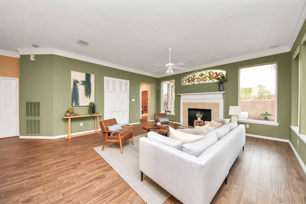 From this angle, you can see the door to the left, which leads to the half bath, and the door to the right, which takes you to the primary bedroom.