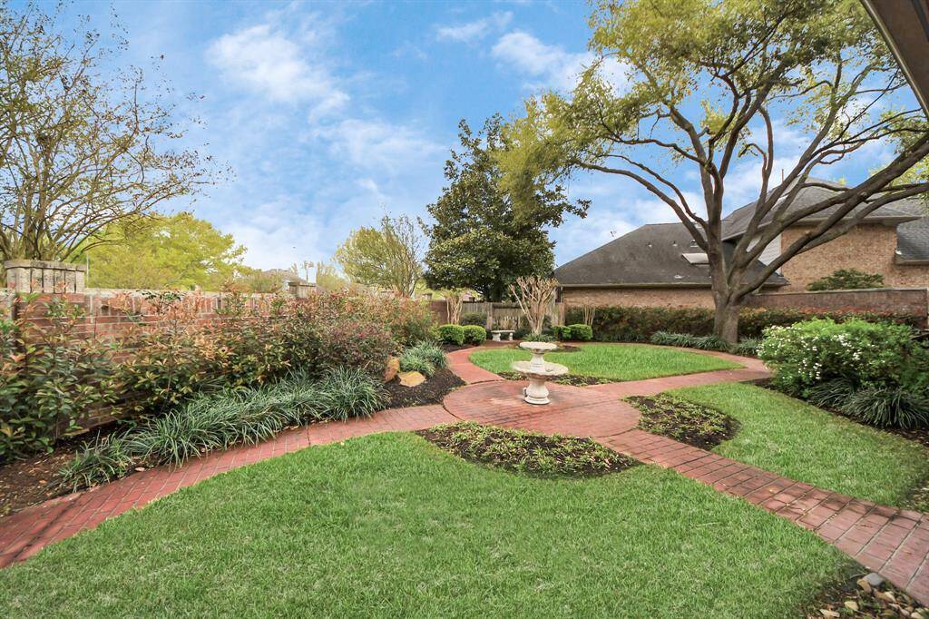 Imagine waking up to this beautiful backyard view every morning or stepping into the living room and instantly enjoying the serene outdoor scenery. Just open the blinds and take it all in!
