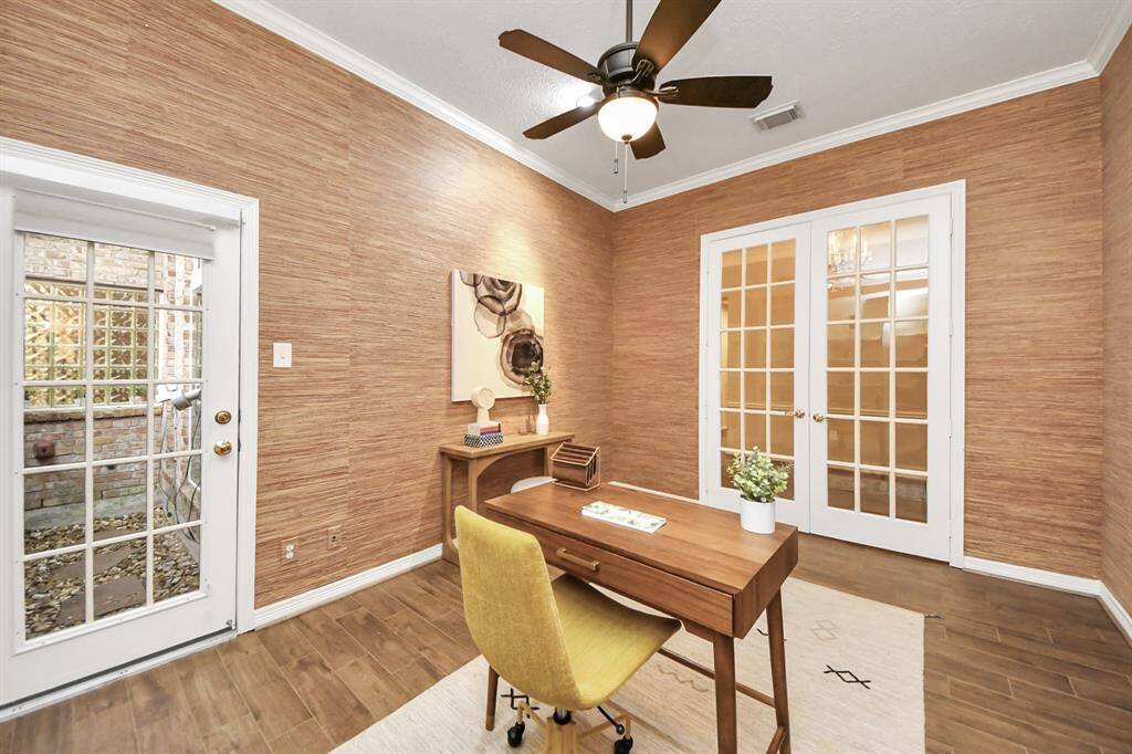 The French doors add a nice touch to the space while also providing privacy when needed.