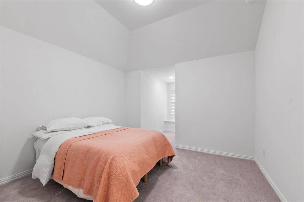 Versatile fifth bedroom featuring a charming window nook