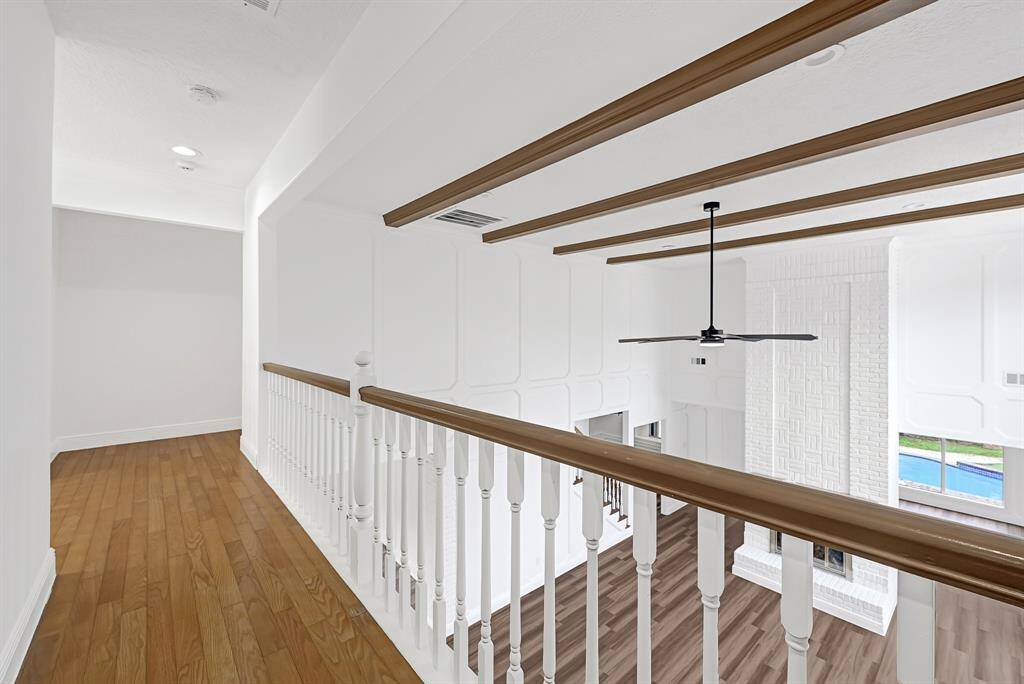 Loft-style overlook with exposed beam ceilings.