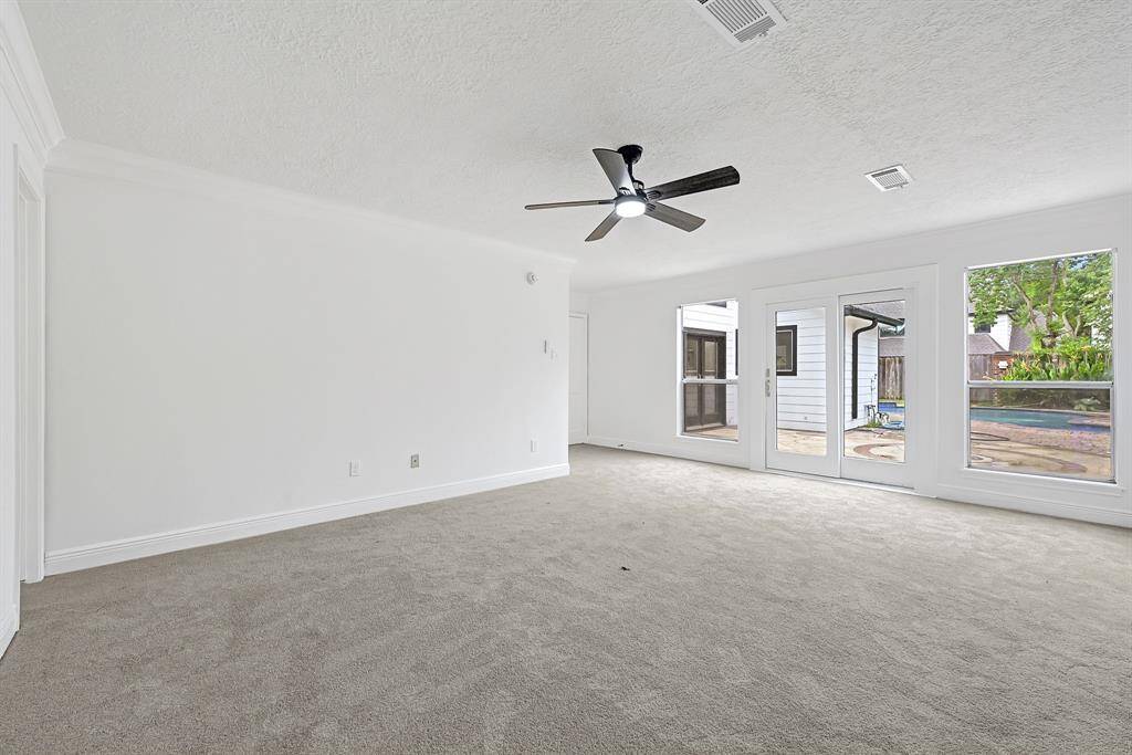 Primary Bedroom with private backyard access