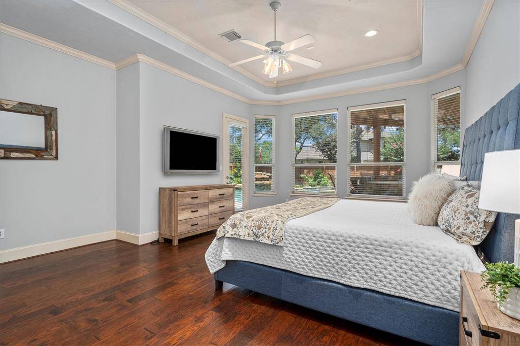 Primary suite is located on a private wing downstairs