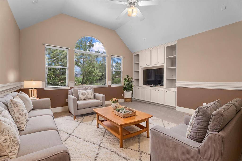 Step up to the private game room with double French doors perfect for sound reduction when the kids have friends over!