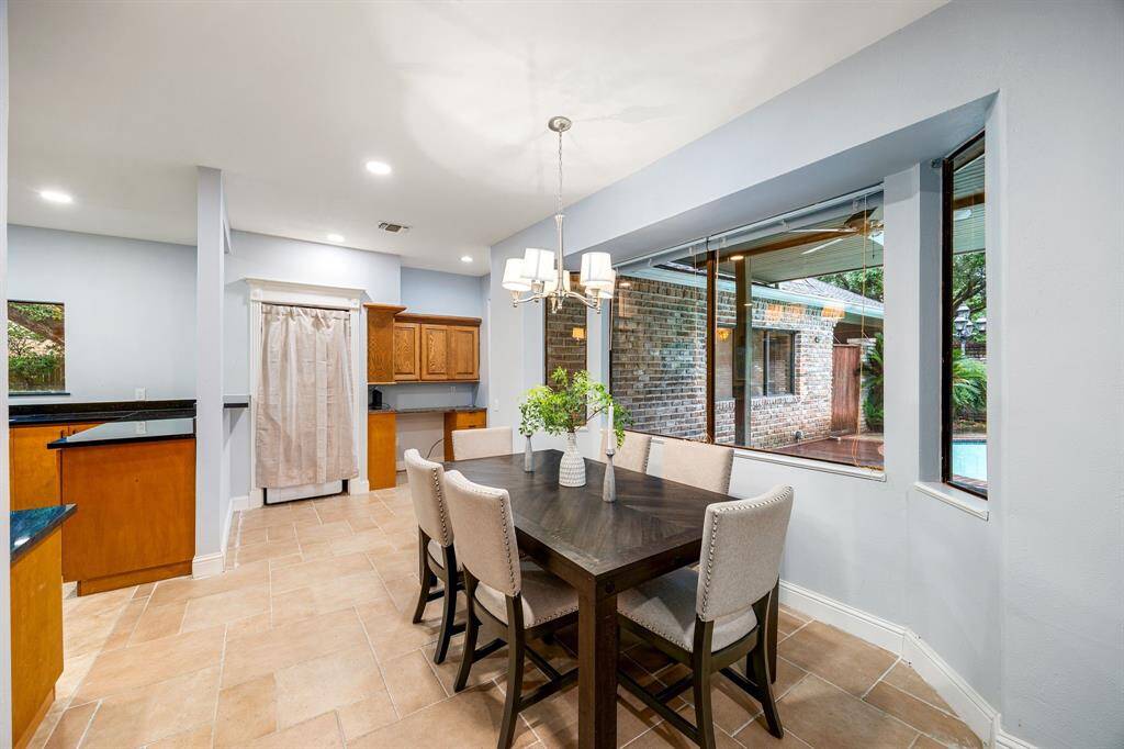 The breakfast area sits right off the kitchen, offering a convenient spot for casual meals and morning routines.