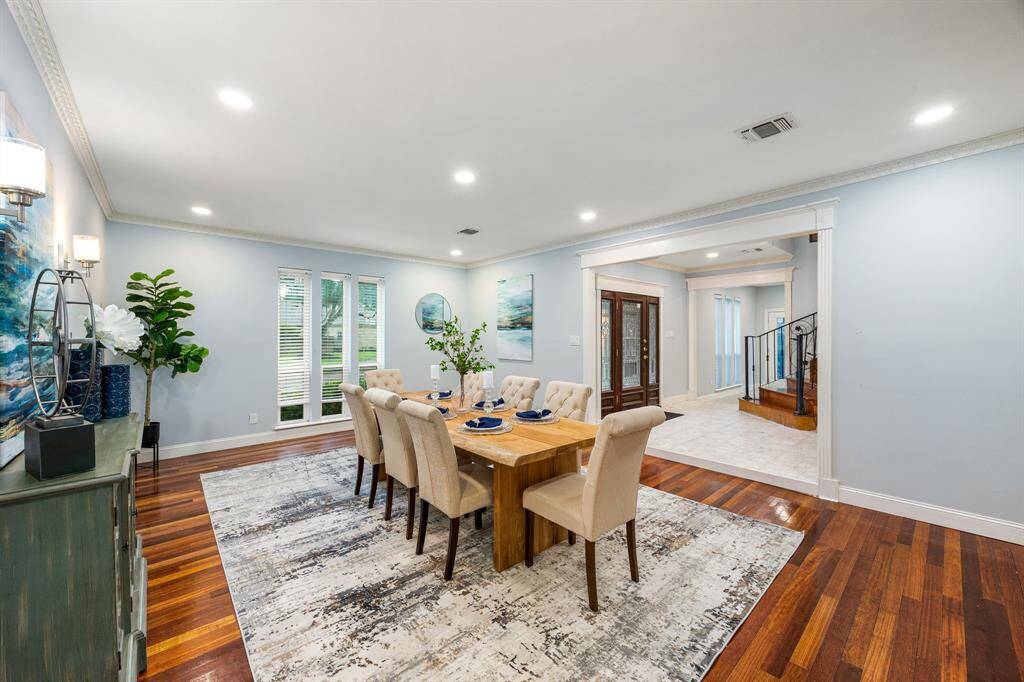 Conveniently located right across from the kitchen, it ensures effortless serving and a seamless flow for entertaining guests.