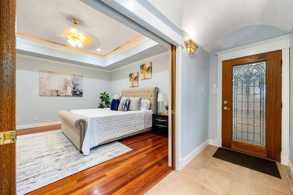 Tucked away in its own separate wing of the house, it provides a peaceful retreat from the main living areas.