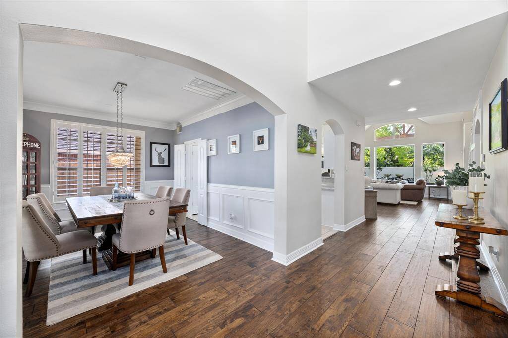 Formal dining room is located off the front entry and conveniently connects to the ktichen.