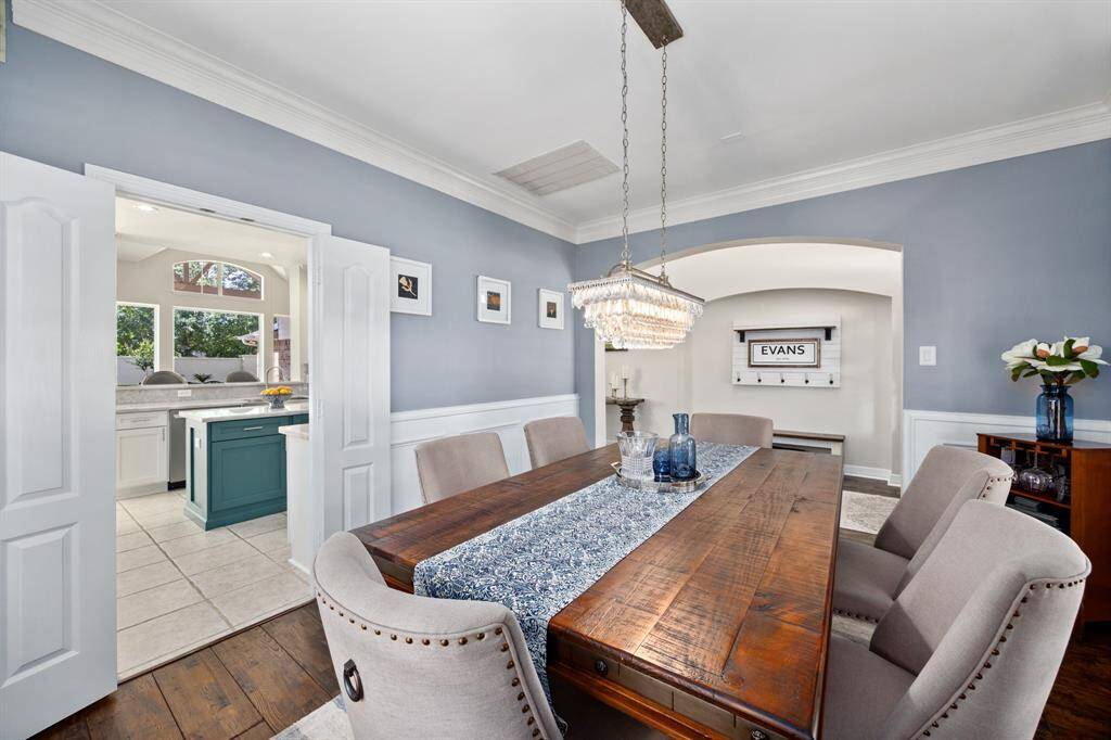 Formal dining room is located off the front entry and conveniently connects to the ktichen.
