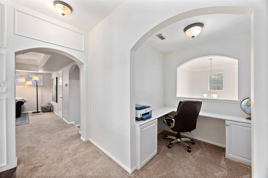 Upstairs nook with built-in desk is perfect for working from home or doing homework.
