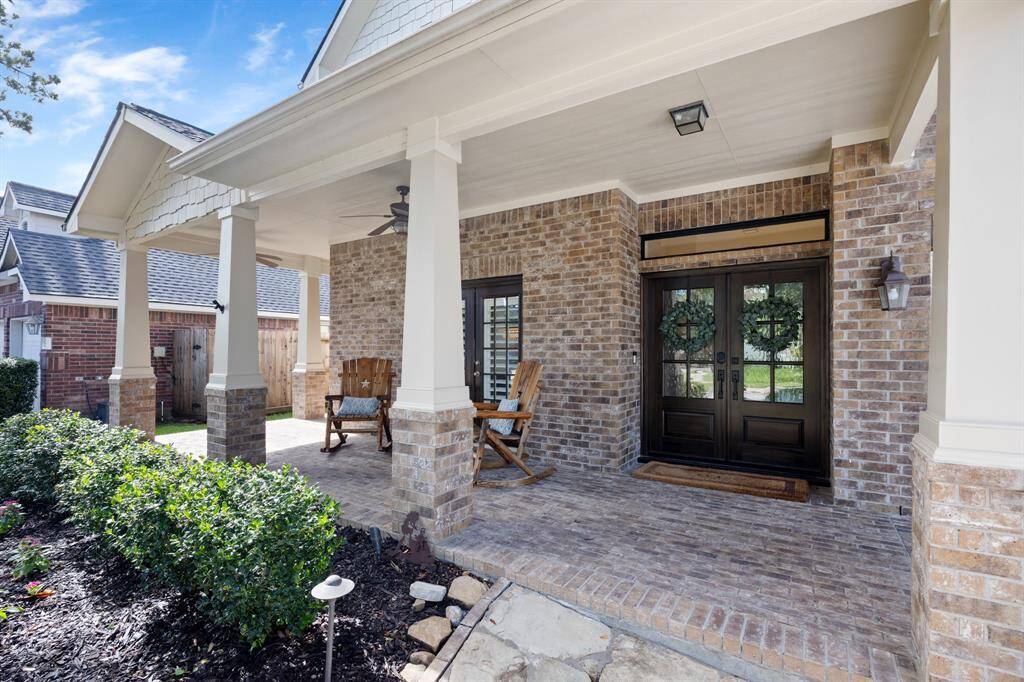 Owners added these gorgeous double doors to create the perfect entry combined with the front porch.