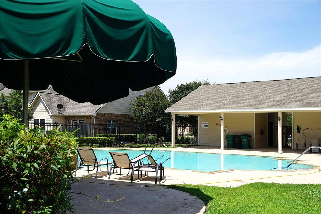 Community Pool with large umbrellas to get our of the sun!