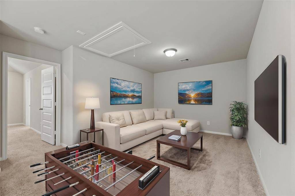 Upstairs, a generously sized den or game room provides the perfect space for relaxation, recreation, or family fun. - virtually staged