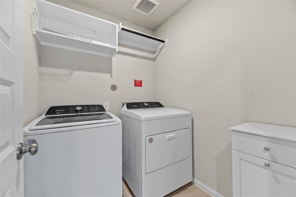 Experience convenience with the in-house utility room, thoughtfully designed with a dedicated laundry area.