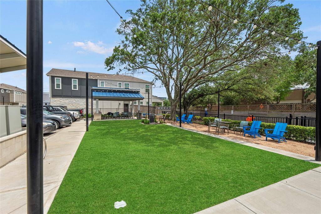 A centrally located, lit outdoor area within the community, offering a welcoming space for evening gatherings and strolls.