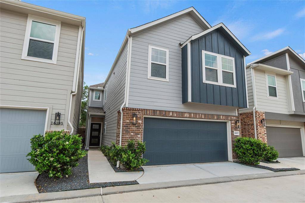 Welcome home to 16107 Hilltop Oak Drive, nestled in the charming  Park Row Village community!