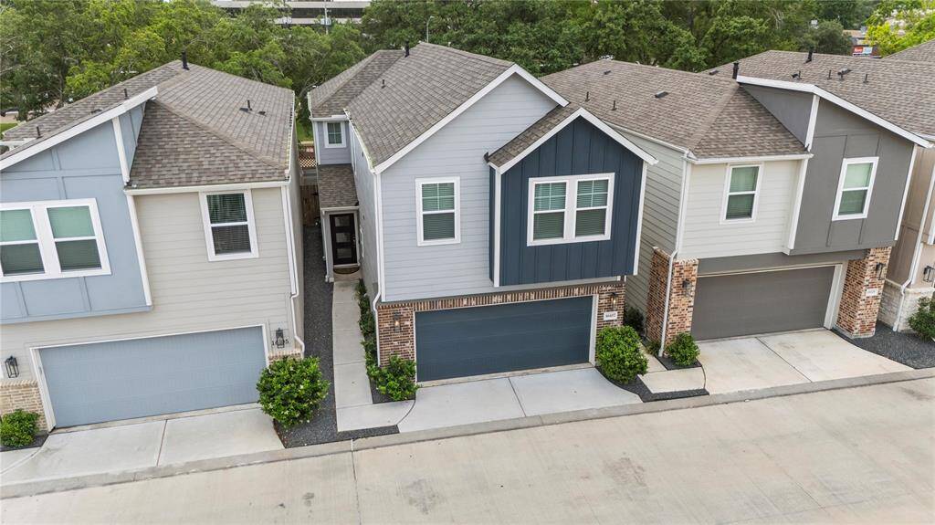 Stunning aerial perspective highlighting the charm and character of this beautiful home.