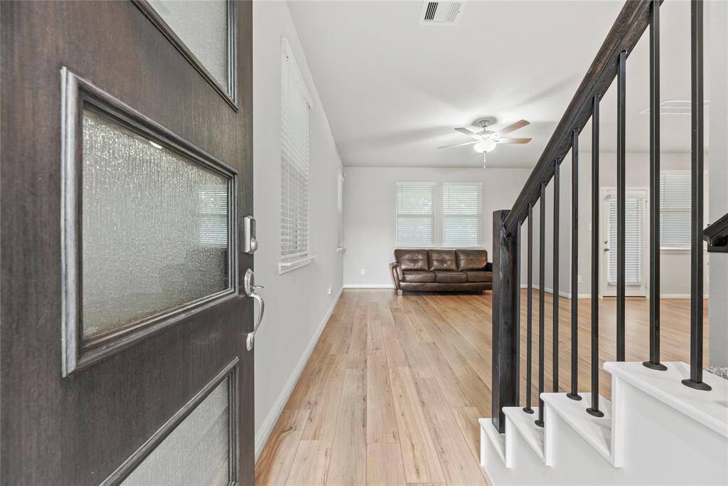Step inside to discover stunning vinyl wood plank flooring that flows seamlessly throughout the downstairs living areas, combining style with durability.