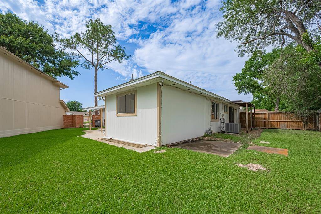 Expansive and enclosed, the backyard offers space to roam, entertain, or unwind. A canvas for imagination and leisure.