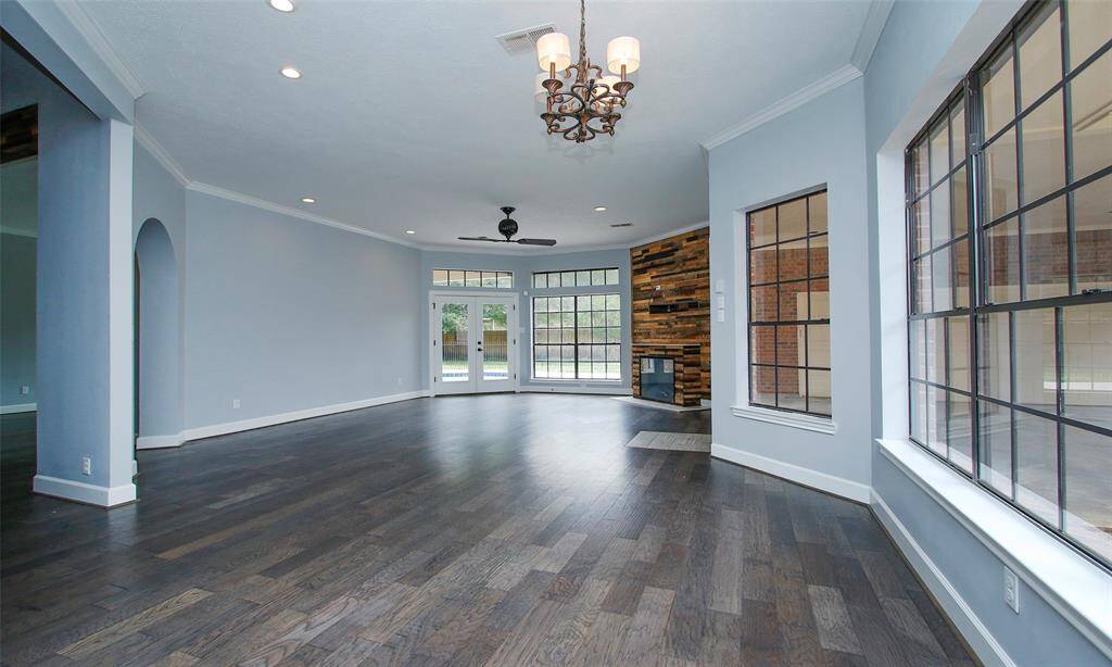 A view from the kitchen showcases the spacious family room, offering an open and connected living area.