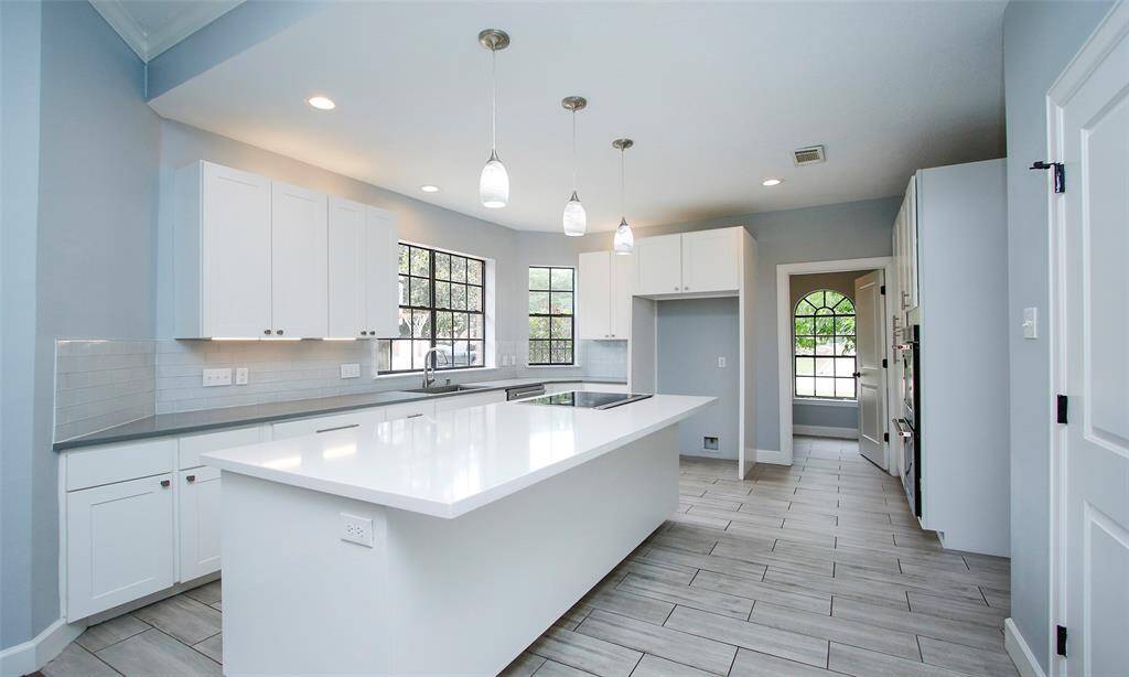 Welcome to the kitchen, the heart of the home, where culinary magic comes to life in a bright and inviting space.