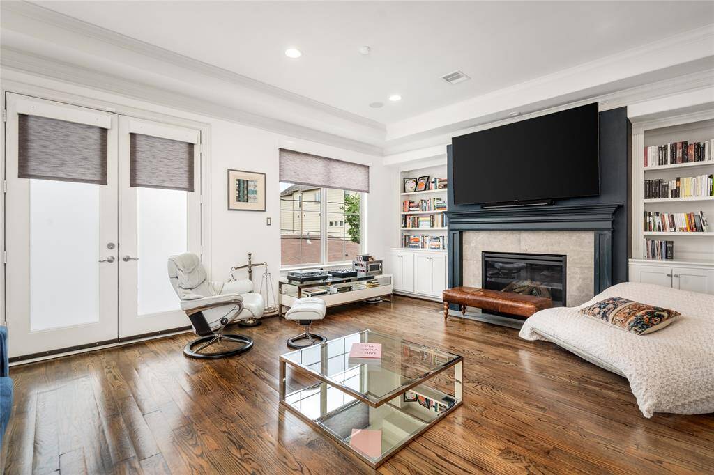 Living room doors leading out to outdoor patio area