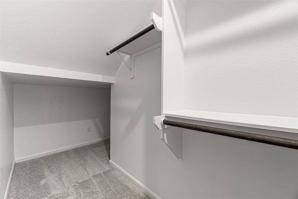 2nd Bedroom Closet Wraps around under stair case.