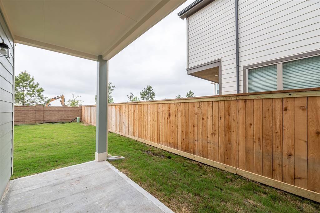 Covered Back Patio on 1st floor off Flex Room