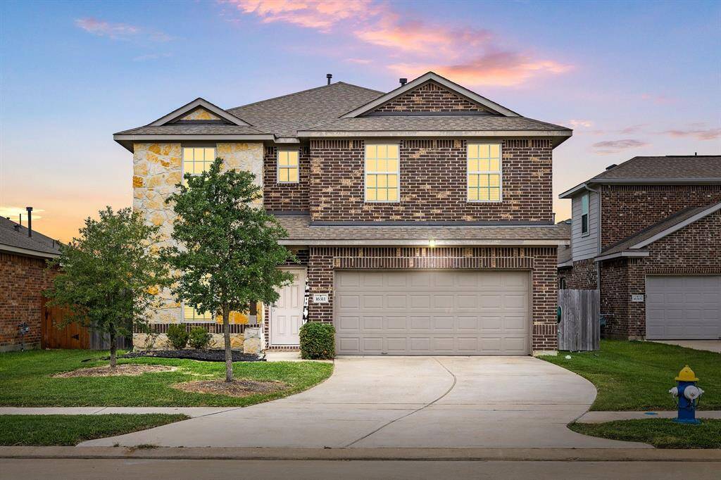 Welcome home to 16311 Westley Ridge Dr. located on a quiet cul-de-sac street in Stone Creek Ranch and zoned to Katy ISD! This stunning home has lovely curb appeal, a well-manicured lawn, beautiful landscaping, brick elevation, traditional style, dark with a double wide driveway!