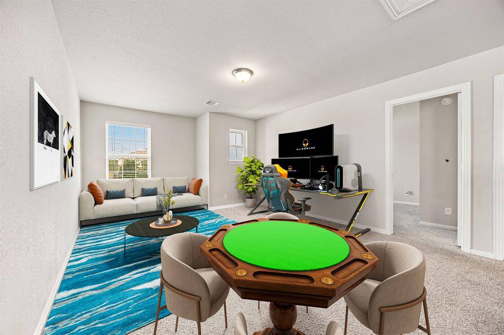 Perfect for entertaining is this amazing game room!  Right upstairs this space would be a fabulous teen hangout, media room, or adult game room complete with pool table and big screen TVs. Featuring plush carpet, high ceilings, custom paint and a large window with privacy blinds. *Virtually Springs